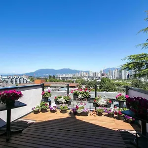 Stunning Skyline Views From A Cozy Vancouver